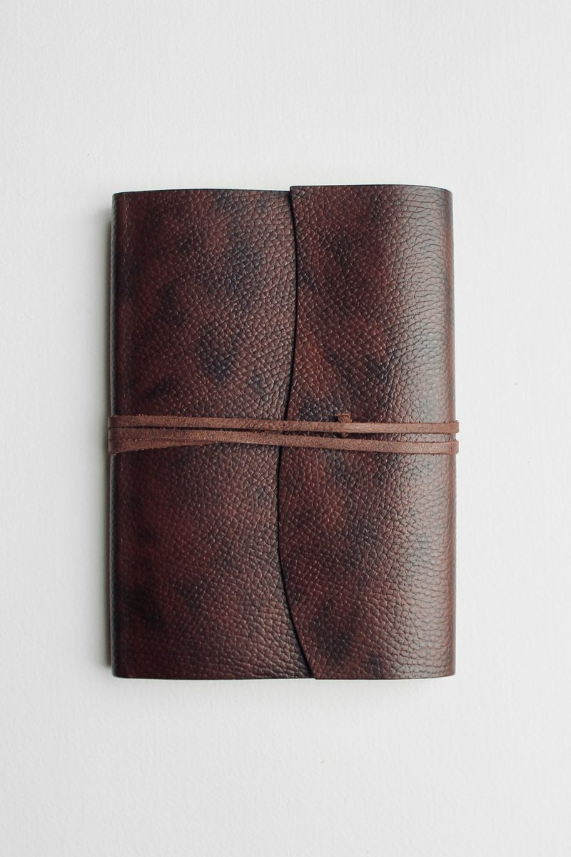 A burgundy leather journal
